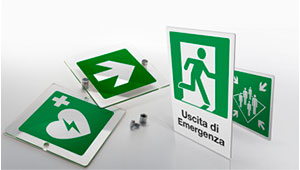 10PZ TARGHETTA ADESIVA USCITA DI EMERGENZA (FRECCIA A SINISTRA) - cm.15x5h